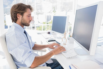GuyWorkingOnComputer